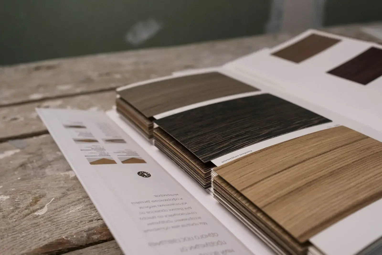 Wood flooring samples laid out on a table